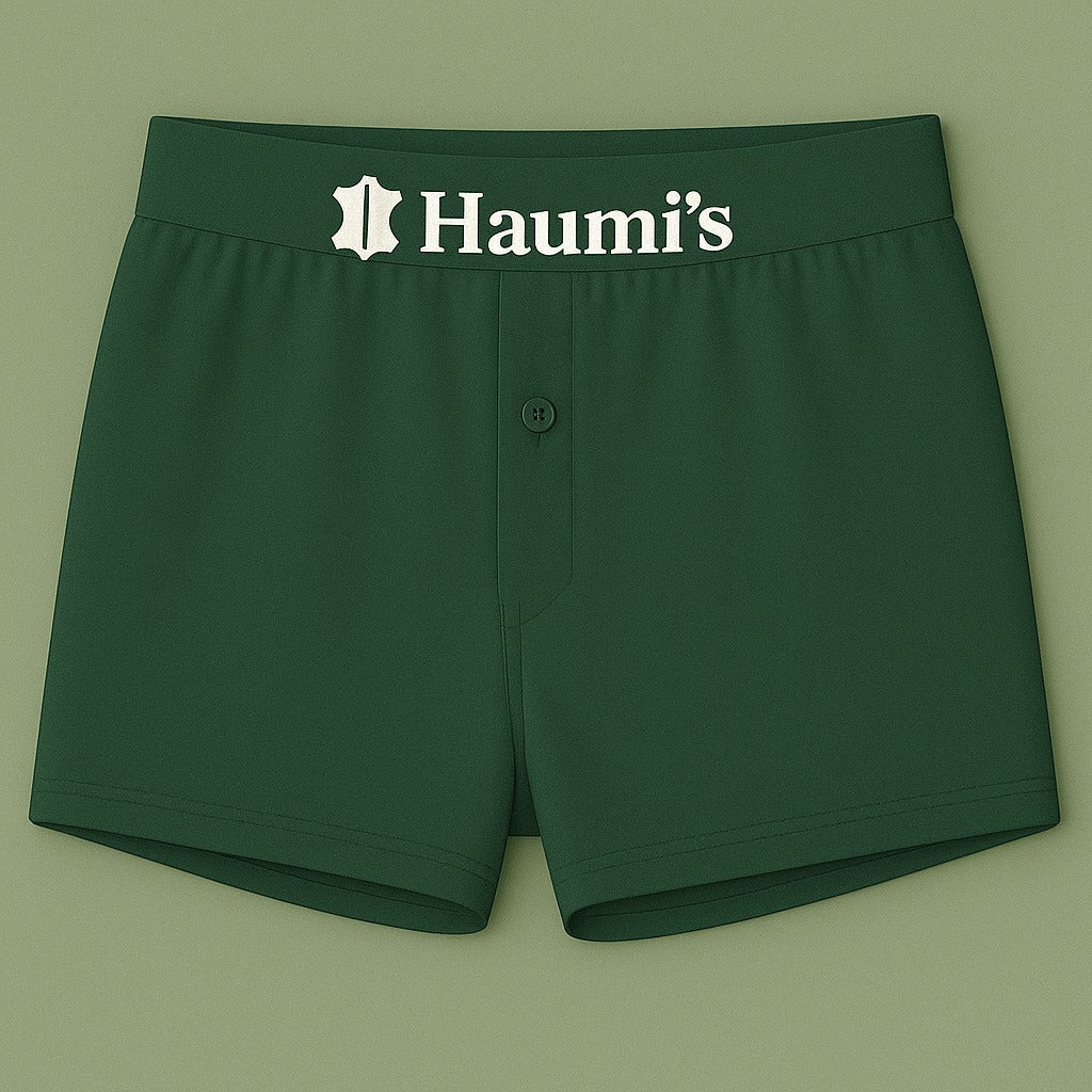 Vibrant green underwear by HAUMIS featuring the iconic 'Haumi's' logo on the waistband.