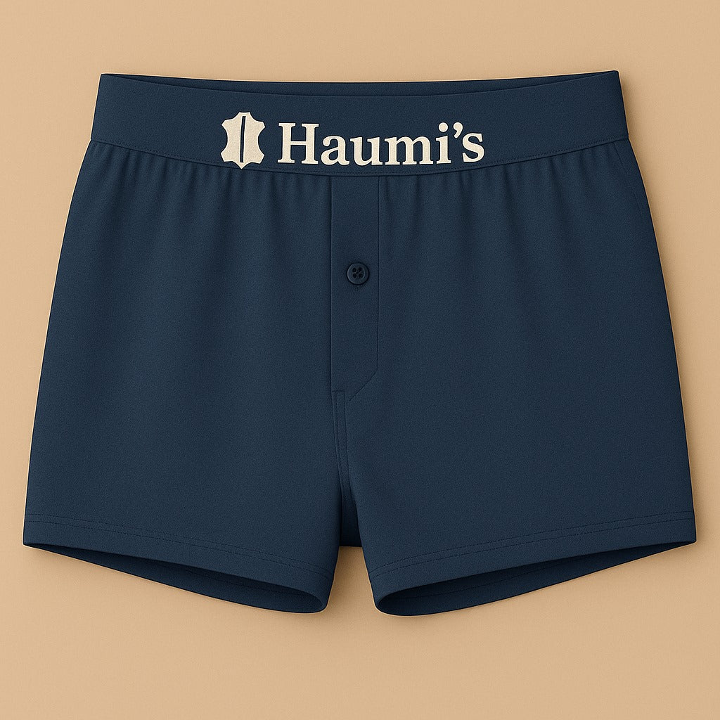 Elegant navy blue underwear by HAUMIS with the 'Haumi's' logo prominently displayed on the waistband.